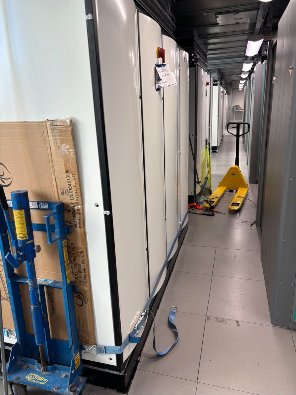 Row of floor-standing close control units along a service corridor in Cardiff